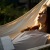 A woman laying in a hammock